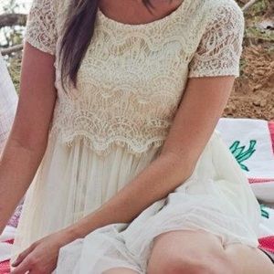 Cream short lace dress with tool bottom
